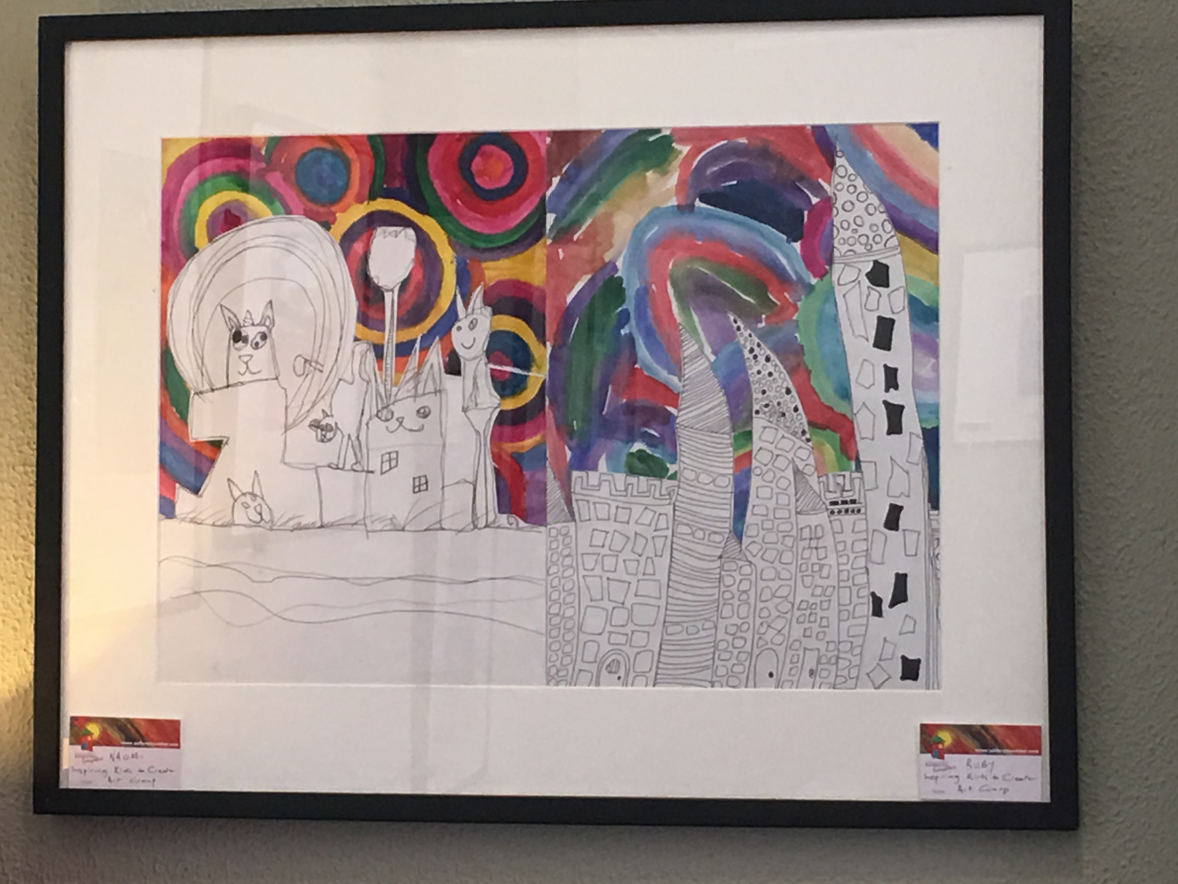 Closeup of Naomi's picture sharing a frame with another picture by her friend Ruby